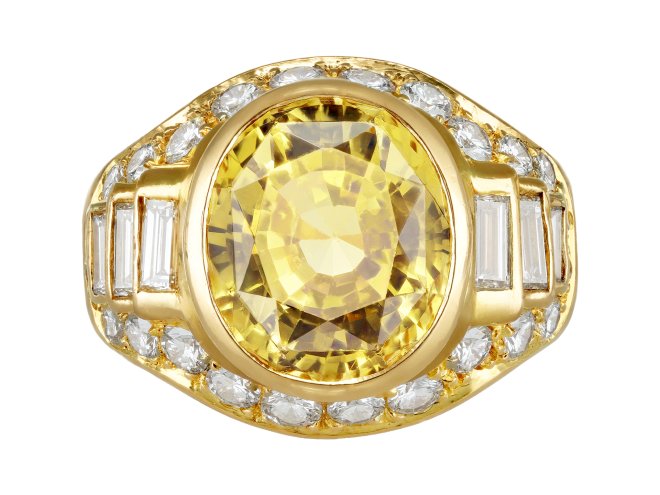 Yellow Ceylon sapphire and diamond cluster ring, circa 1970.
