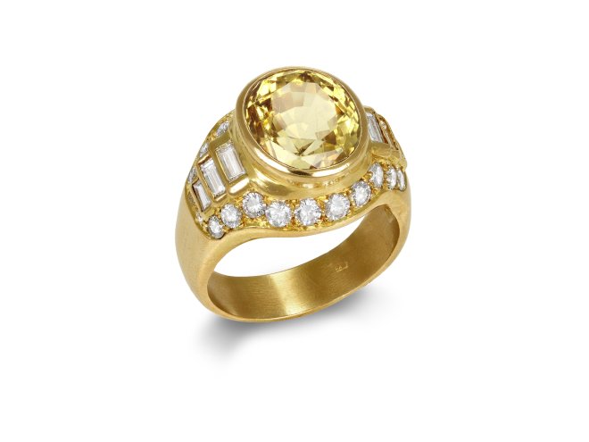 Yellow Ceylon sapphire and diamond cluster ring, circa 1970.