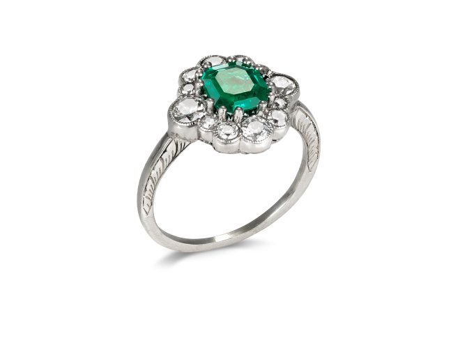 Emerald and diamond cluster ring, circa 1920. 