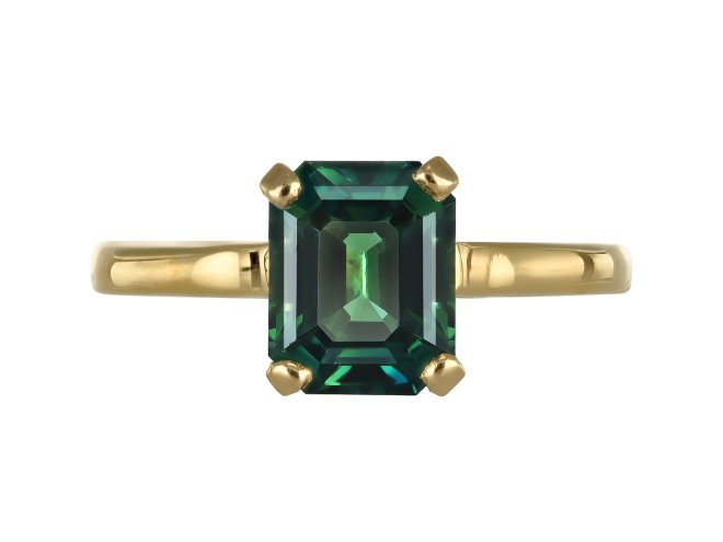 Green sapphire solitaire ring, circa 1980. 