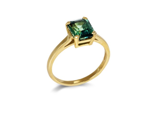Green sapphire solitaire ring, circa 1980. 