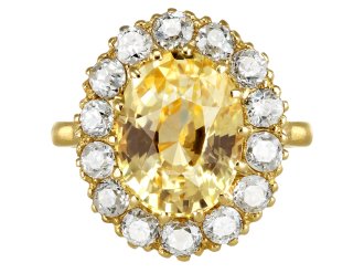 Yellow sapphire and diamond coronet cluster, circa 1900. 