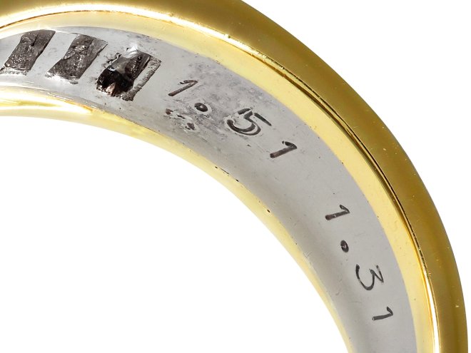 Diamond flanked solitaire ring by Friedrich, German, circa 1990.