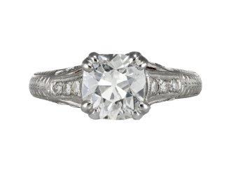 Diamond flanked solitaire ring, American circa 1940. 