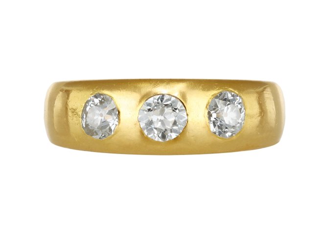 Diamond three stone gypsy ring, circa 1900.