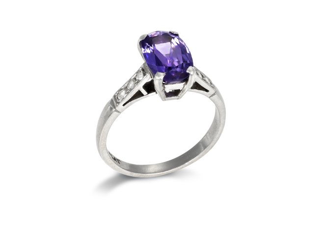 Purple Sapphire Flanked Solitaire ring, circa 1950. 