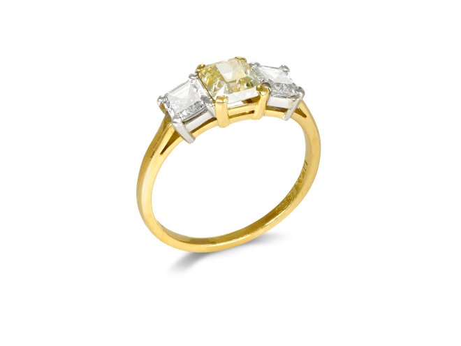 Fancy Yellow Diamond diamond three stone.