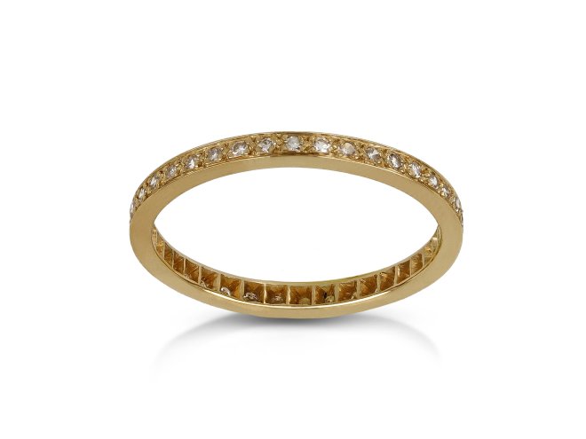 Diamond full eternity ring, circa 1950.