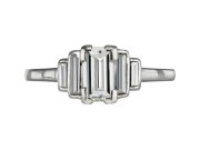 Art Deco diamond flanked solitaire ring, 1935. 