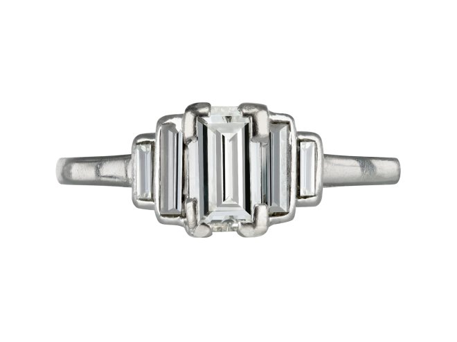 Art Deco diamond flanked solitaire ring, 1935. 