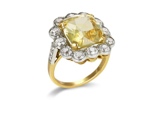 Yellow Ceylon sapphire and diamond coronet cluster ring, circa 1910.