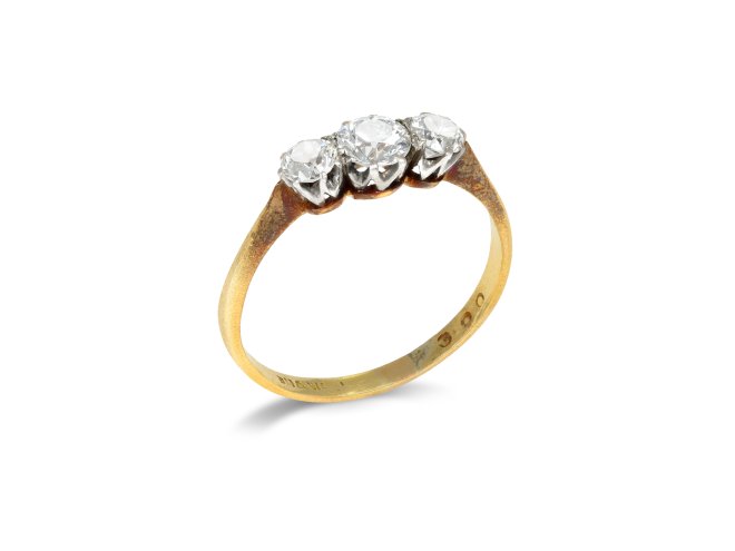Old cut diamond three stone ring, circa 1910.