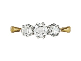 Old cut diamond three stone ring, circa 1910.