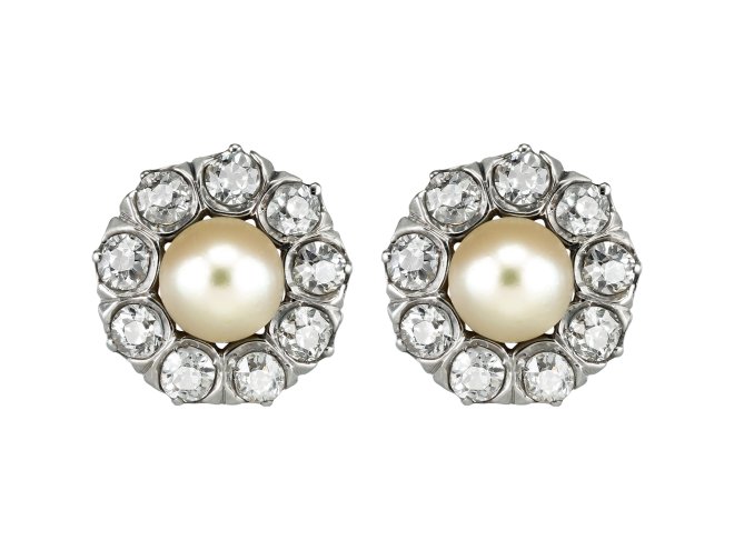 Natural pearl and diamond cluster earrings, circa 1910.