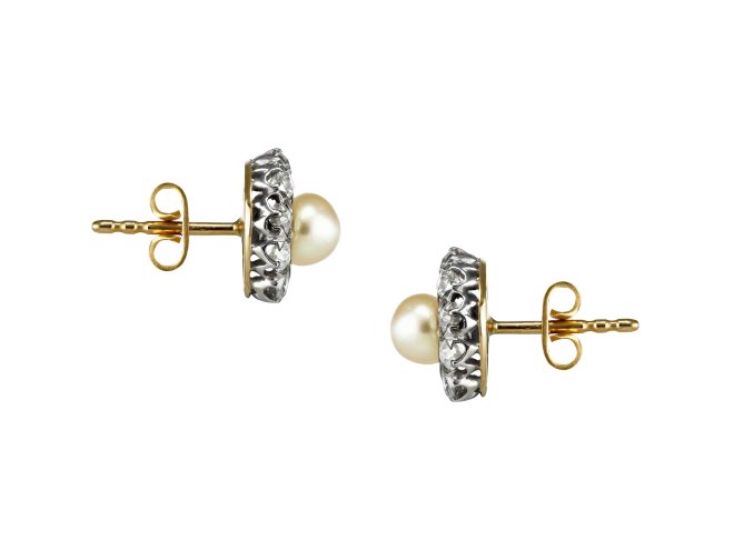 Natural pearl and diamond cluster earrings, circa 1910.