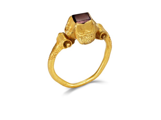 Post Medieval Tudor table cut garnet ring, circa 1530 1600.