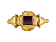 Post Medieval Tudor table cut garnet ring, circa 1530 1600.