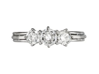 Diamond three stone ring, circa 1950. 