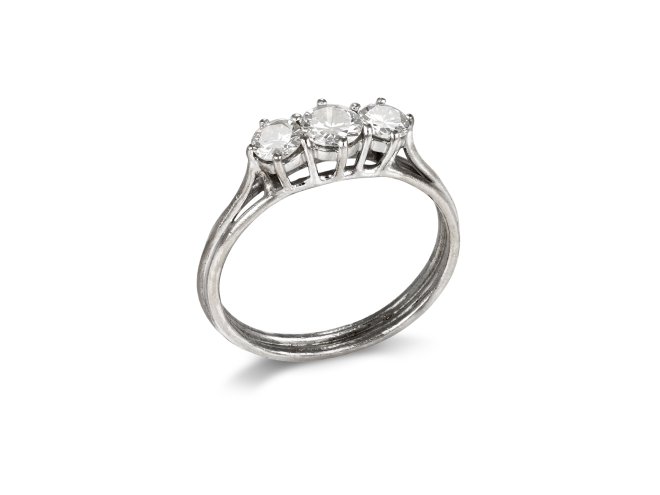 Diamond three stone ring, circa 1950. 