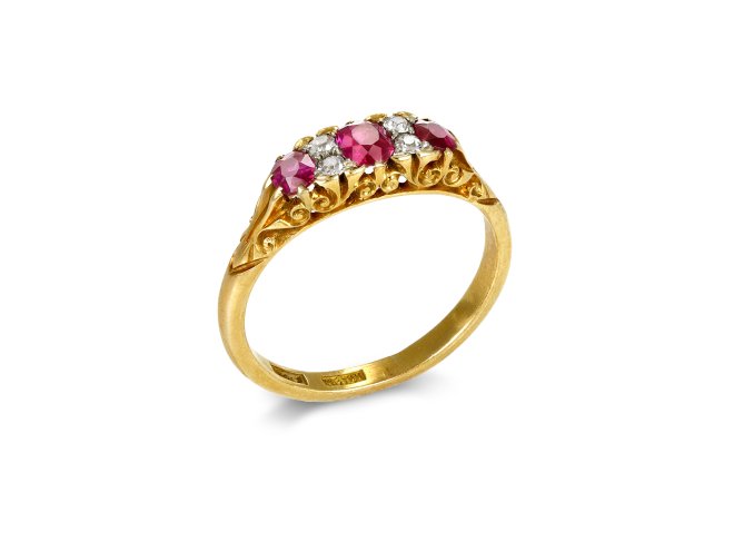 Ruby and diamond seven stone ring, circa 1890. 