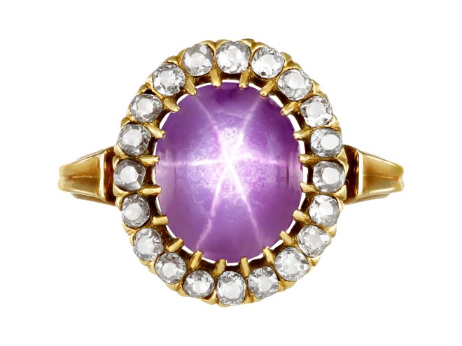 Star ruby and diamond coronet cluster, circa 1900. 