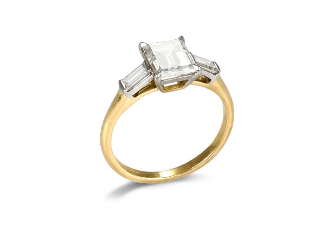 Diamond flanked solitaire, circa 1940. 