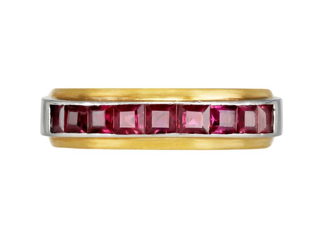 Hemmerle ruby half eternity ring, German, circa 1970. 