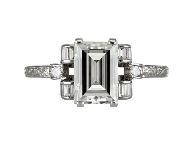 Diamond flanked solitaire, circa 1935.