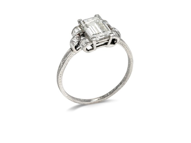 Diamond flanked solitaire, circa 1935.