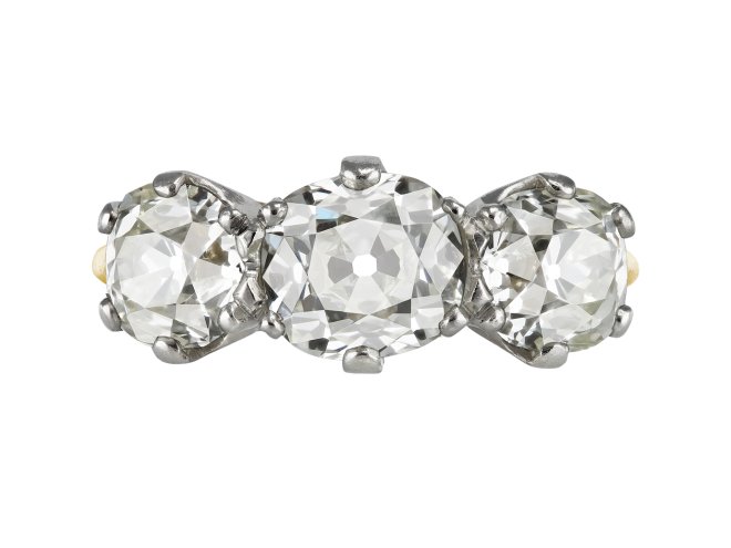 Old mine diamond three stone ring, early 20th Century.