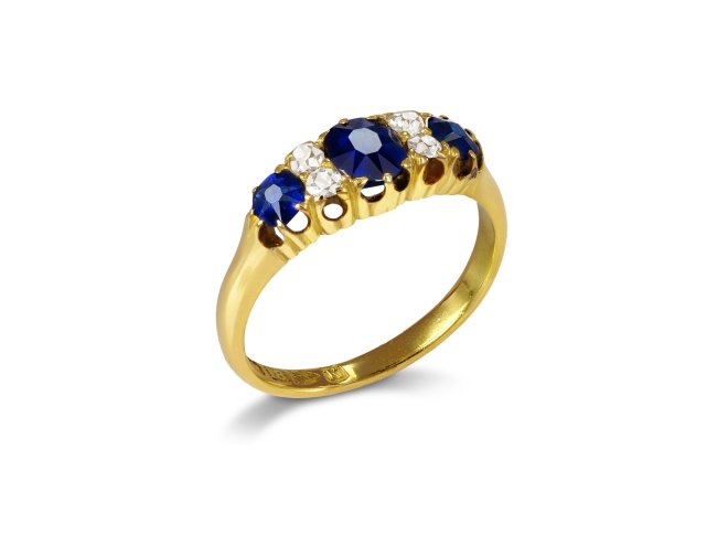 Victorian sapphire and diamond seven stone ring, English, 1893.