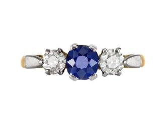 Sapphire and diamond three stone ring, circa 1915. 