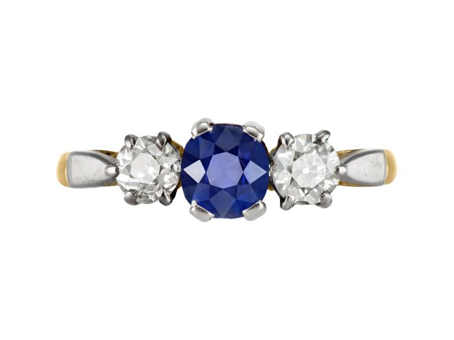Sapphire and diamond three stone ring, circa 1915. 