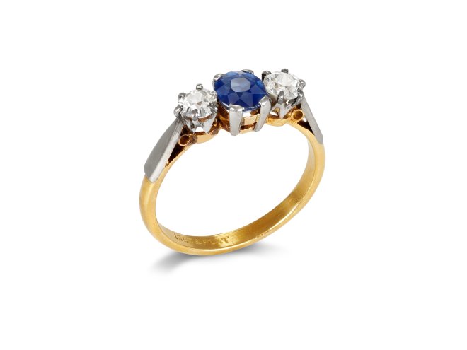 Sapphire and diamond three stone ring, circa 1915. 