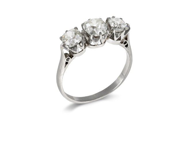 Old mine diamond three stone ring, early 20th Century. 