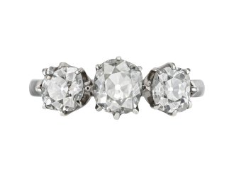 Old mine diamond three stone ring, early 20th Century. 