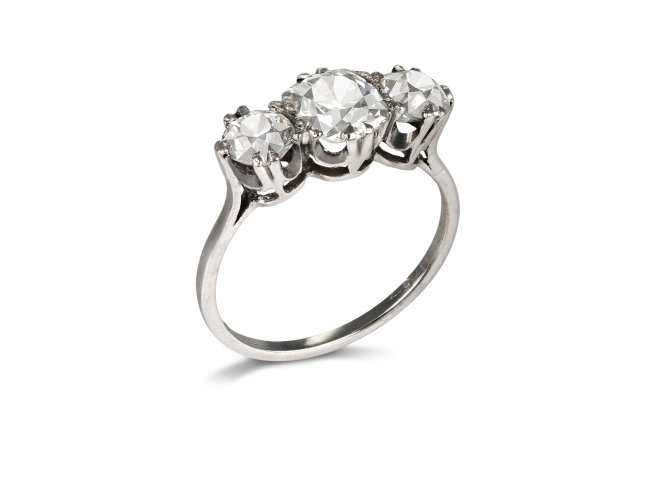 Old mine diamond three stone ring, early 20th Century.
