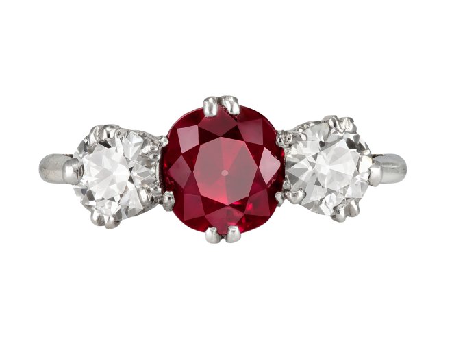 Burmese ruby and diamond three stone ring.