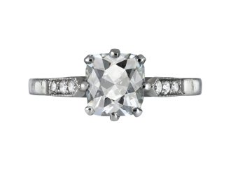 Peruzzi cut diamond flanked solitaire, early 20th Century.