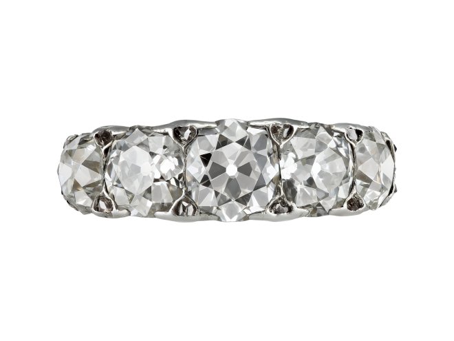 Cushion shape old mine diamond five stone ring, early 21st Century. 