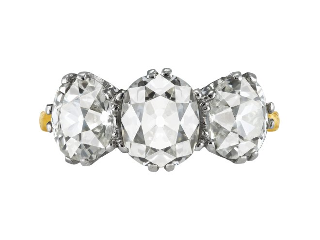 Old mine diamond three stone ring, early 20th Century.
