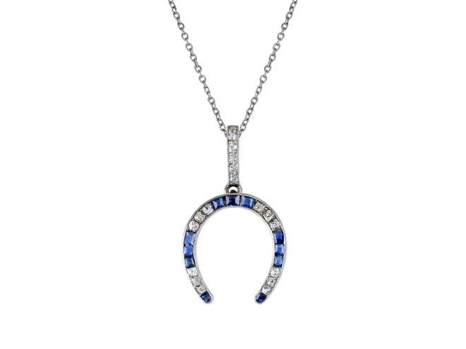 Lacloche Fr&egrave;res sapphire and diamond horseshoe pendant, French, circa 1920.