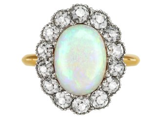 Opal and diamond cluster ring, early 20th Century.