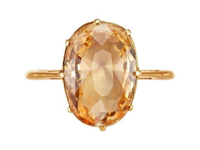 Padparadscha Ceylon sapphire solitaire ring.
