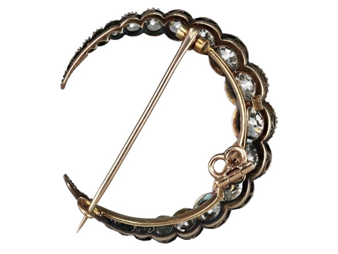 Victorian diamond crescent moon brooch, circa 1890.