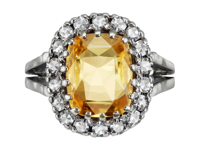 Yellow Ceylon sapphire and diamond coronet cluster ring, mid 20th Century. 