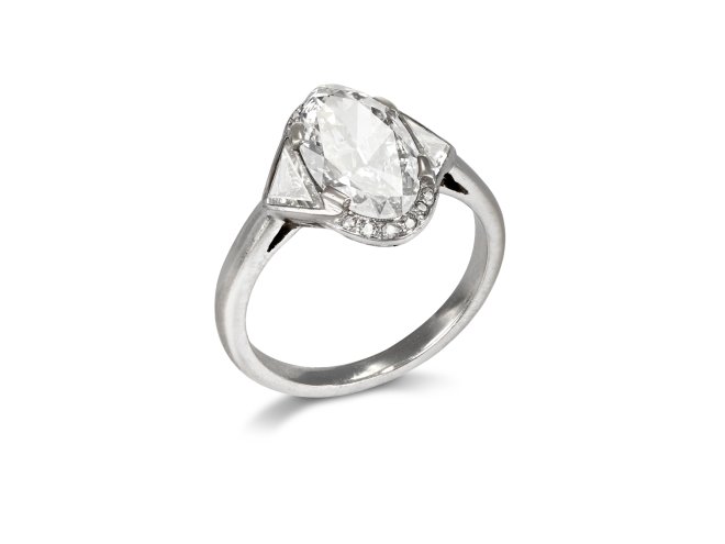 Diamond flanked solitaire, French, circa 1930.