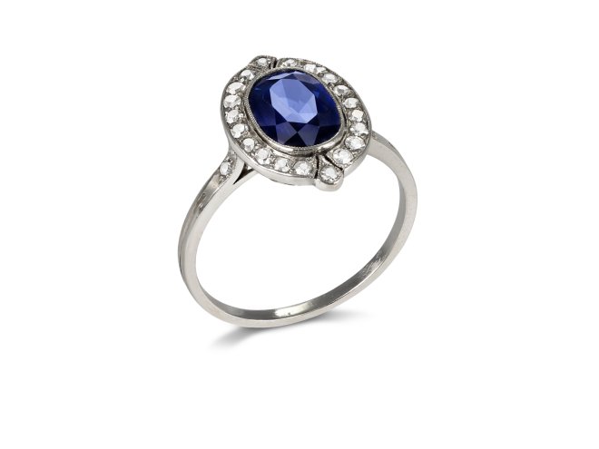 Sapphire and diamond cluster ring, French, early 20th Century.