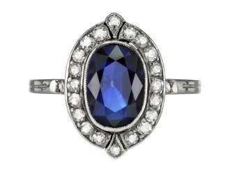Sapphire and diamond cluster ring, French, early 20th Century.
