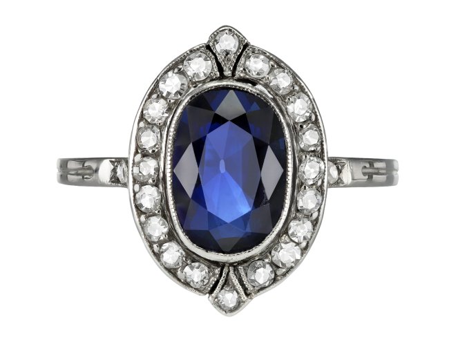 Sapphire and diamond cluster ring, French, early 20th Century.